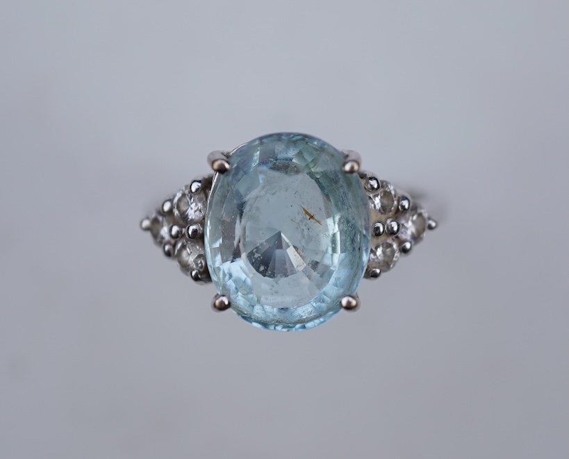 An aquamarine and diamond ring